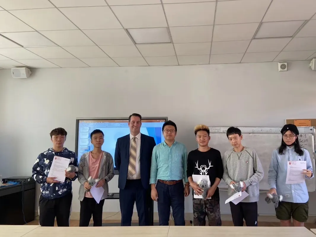 Heath with a group of students in China