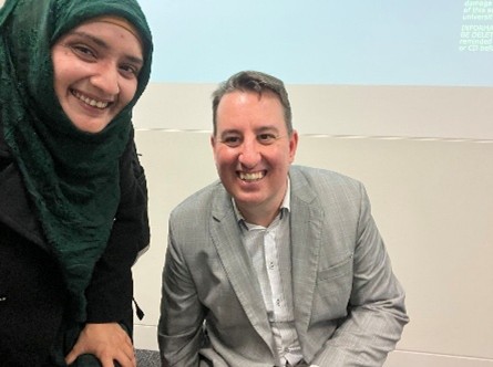 Heath celebrating a student's academic result