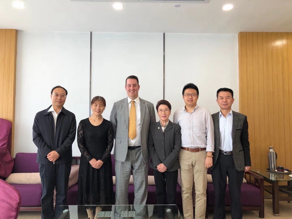 Heath teaching a group of executives in China