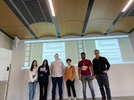 Heath presenting to a lecture audience